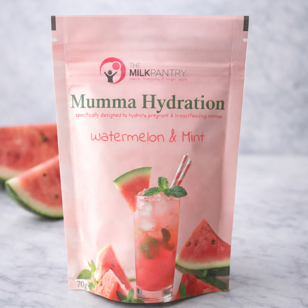 Mumma Hydration watermelon and mint drink package on a marble surface with watermelon slices.