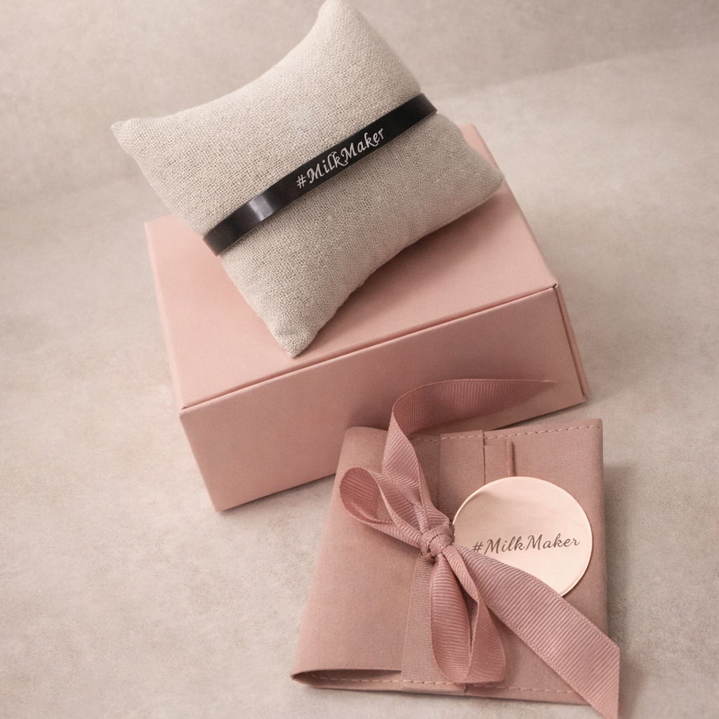Gift box with pink ribbon and pillow on a beige background