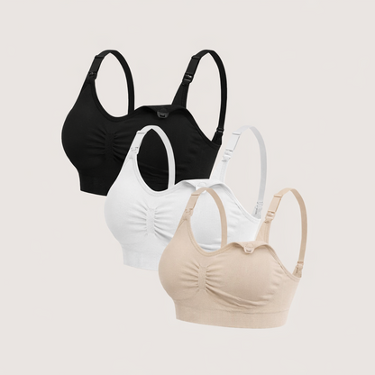 Three bras in black, white, and beige on a light gray background