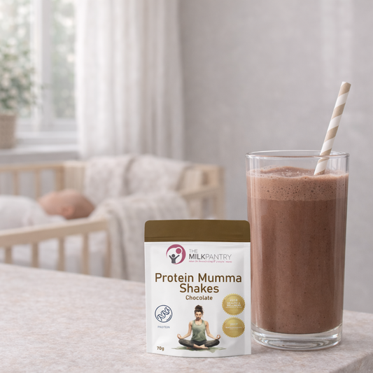 Protein shake and container on a table with a neutral background